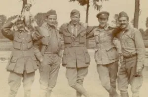 Joshua G.B. Campbell (with his dog, Khaki), Giles, Kingsland, Francklyn, and Cunningham in Flanders, 1915.