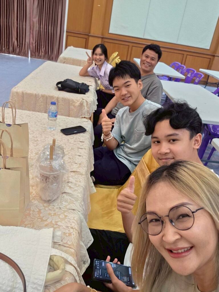 Thai host family and Japanese exchange student at a school orientation ceremony