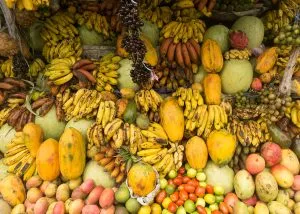 Fruits shop on tropical marketplace