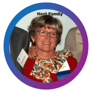 Jenny K. Messner headshot on a blue-purple gradient circle frame.
