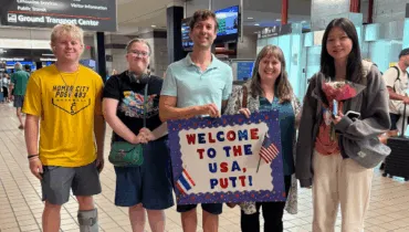 Doran Family with Welcome Sign