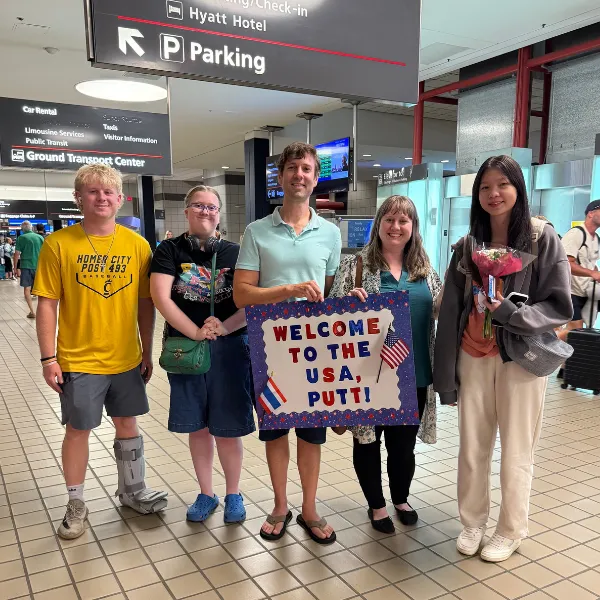 Doran Family with Welcome Sign