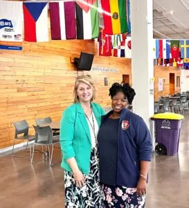 Global school award winner with flags in school