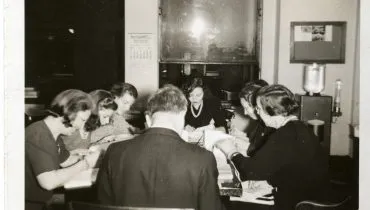 AFS-staff-at-a-table-at-the-New-York-headquarters-at-120-Broadway.-1941.