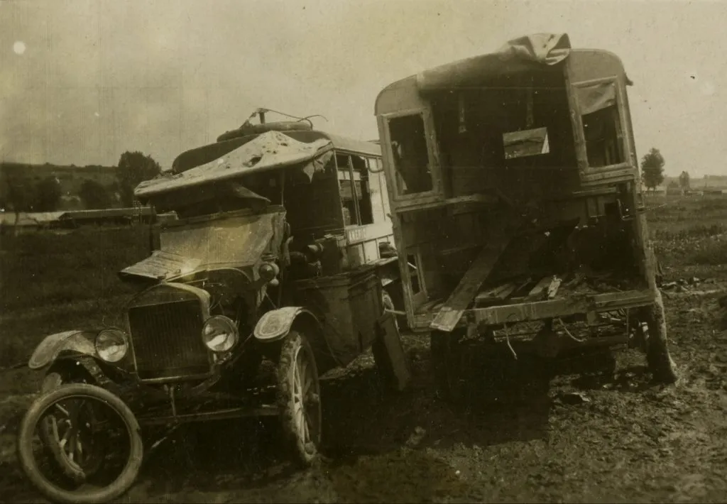 John Newlin's ambulance beside Charles Ball's ambulance after the August 3, 1917 shelling in Montzéville.