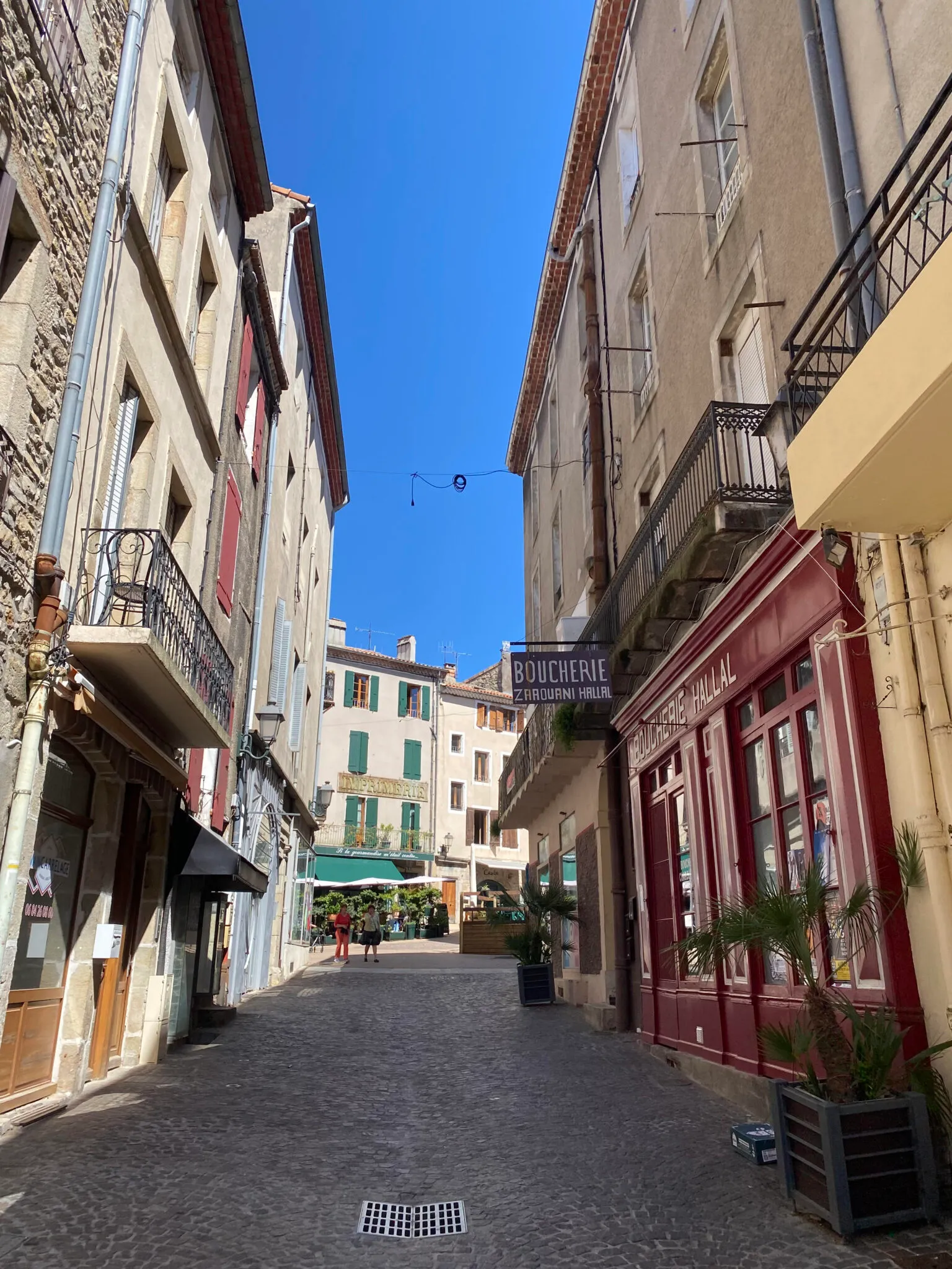 Cobbled street in France with beautiful buildings