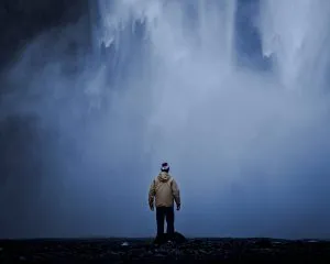 copyman-standing-near-waterfalls-2989054