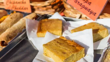 Paraguayan dish called sopa paraguaya at a street food market