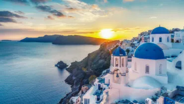 Beautiful view of Churches in Oia village, Santorini island in G